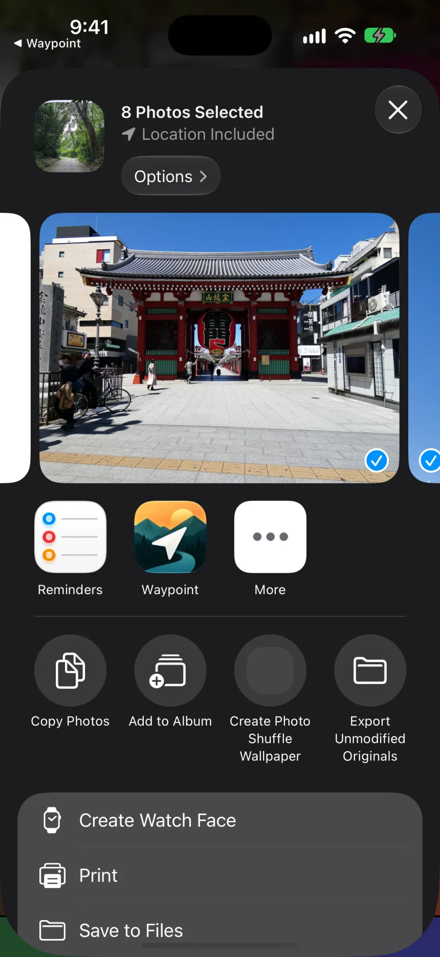 The iOS share sheet with Waypoint as a destination for 8 photos.